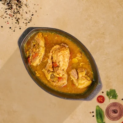Traditional Yemeni Mutton Burma with tender lamb, potatoes, and spices served in a clay pot.